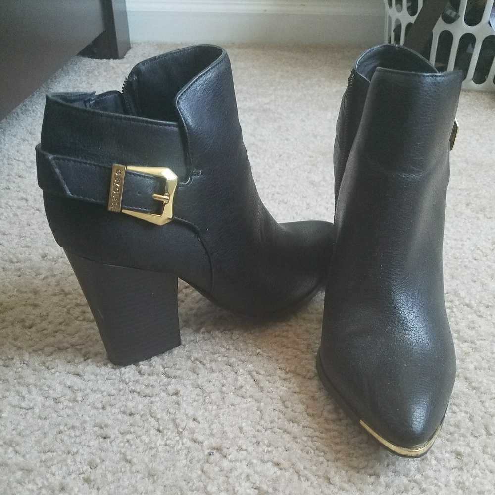 By GUESS booties black with gold accents